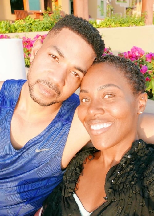 Alano Miller as seen in a selfie taken with his wife actress DeWanda Wise while on a vacation in December 2019