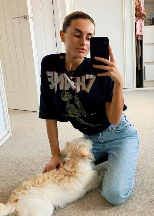 Amber Davies as seen while clicking a mirror selfie along with her pup in April 2020