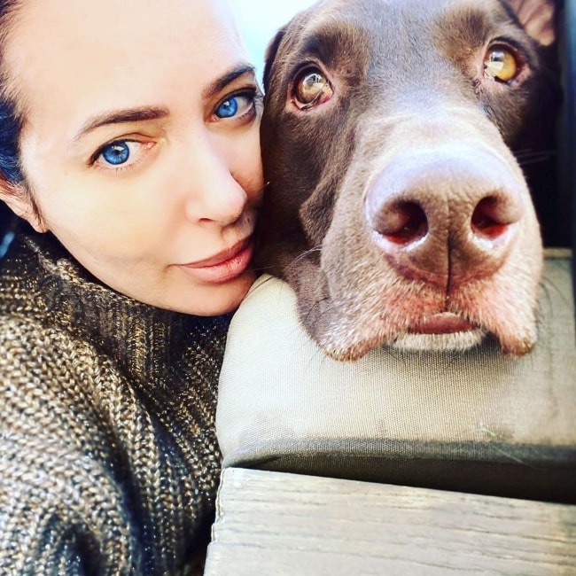 Amy Weber as seen in a selfie taken with her dog in April 2020