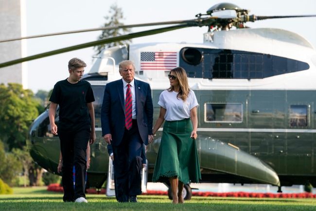 Barron Trump seen with his parents in August 2019