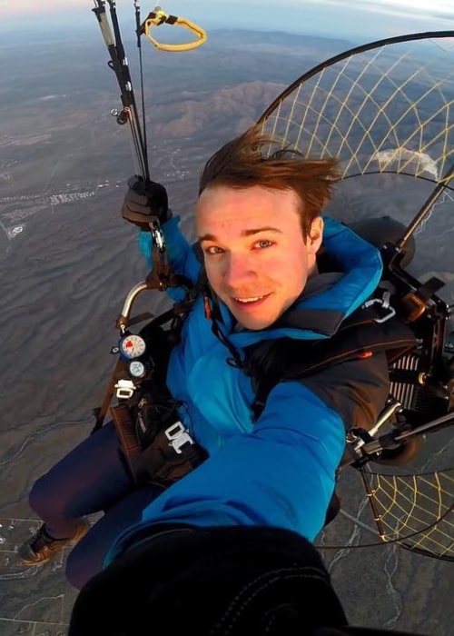 Black Gryph0n in an Instagram selfie that was taken while paragliding in March 2019