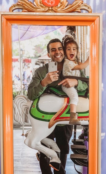 David Lopez having a funtime with his daughter in Disneyland in the past