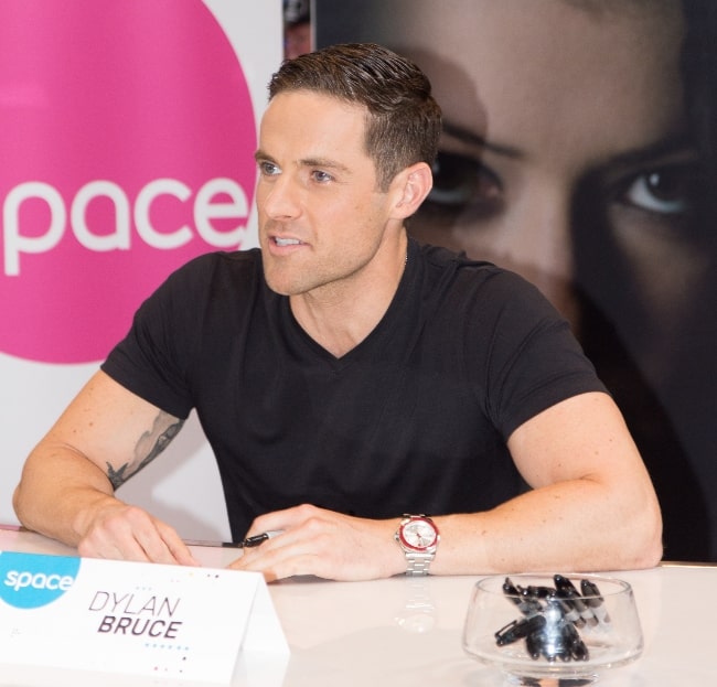 Dylan Bruce as seen during an event in 2013