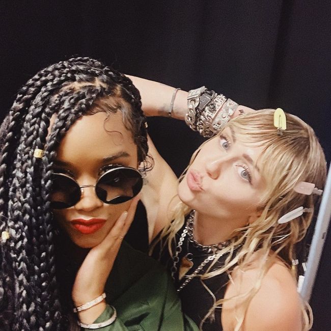 H.E.R. as seen with Miley Cyrus in 2019