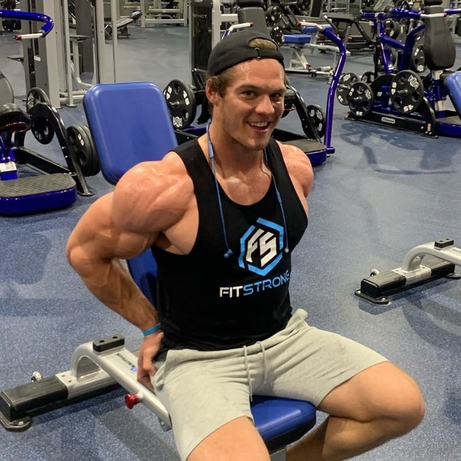 Jeremiah Buoni smiling for a picture while working out at Crunch Fitness in January 2020