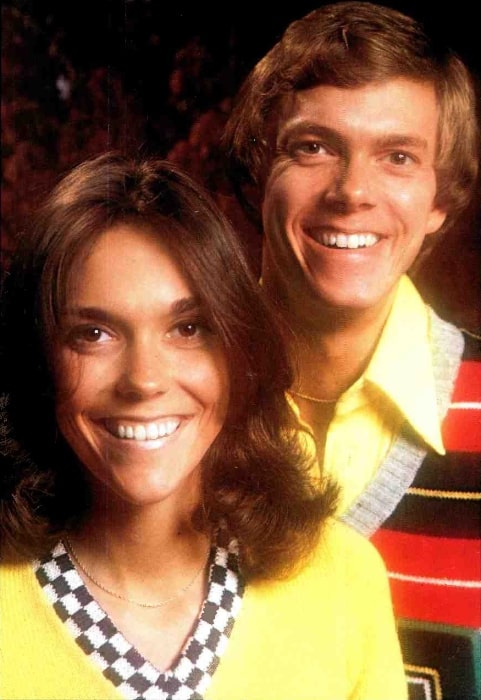 Karen Carpenter and Richard Carpenter as seen while smiling for a picture circa 1974