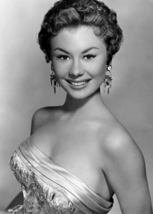 Mitzi Gaynor as seen while smiling for the camera c. 1954