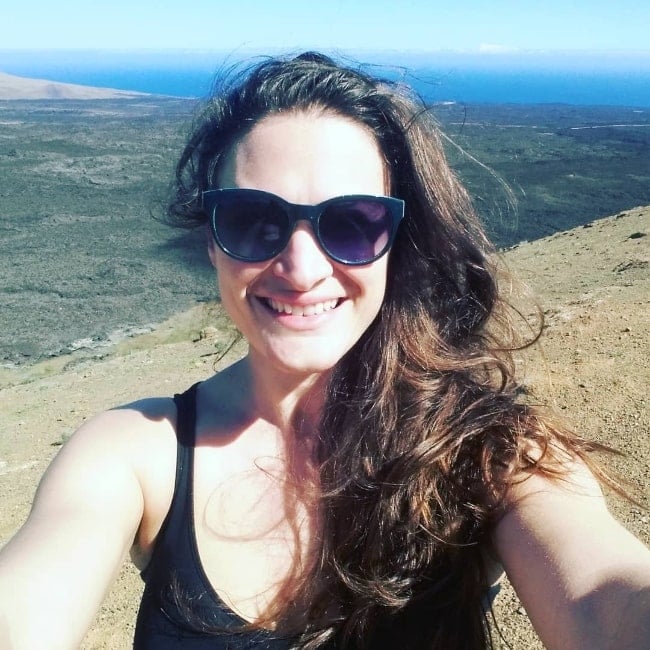 Nina Samuels as seen while smiling for a selfie at Timanfaya National Park in March 2018