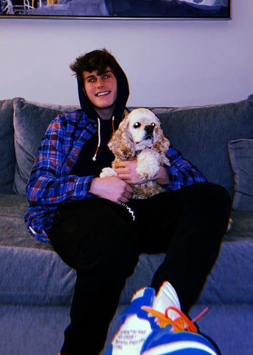 Ryan Wauters with his dog as seen in March 2020