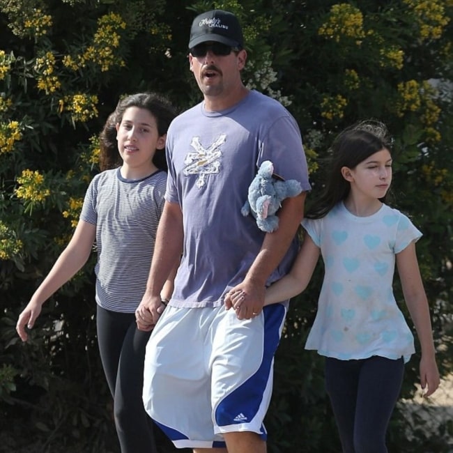 Sadie Sandler as seen in a picture taken with her younger sister Sunny and father Adam Sandler at the 2018 Malibu Chili Cook Off