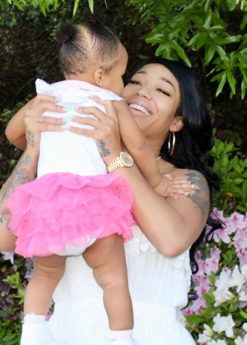 Shawne Williams's girlfriend Jessica Dime and daughter as seen in May 2019