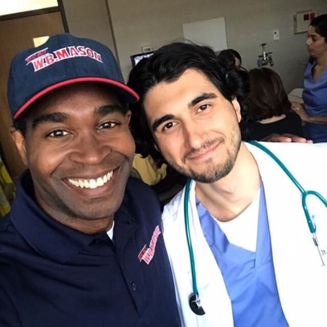 Shayan Sobhian (Right) as seen while smiling in a selfie alongside George Robert in July 2019