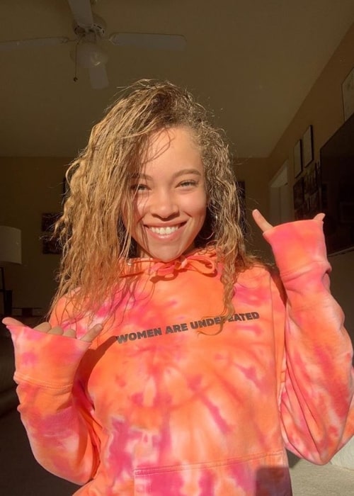 Shelby Simmons as seen while smiling for a picture in May 2020