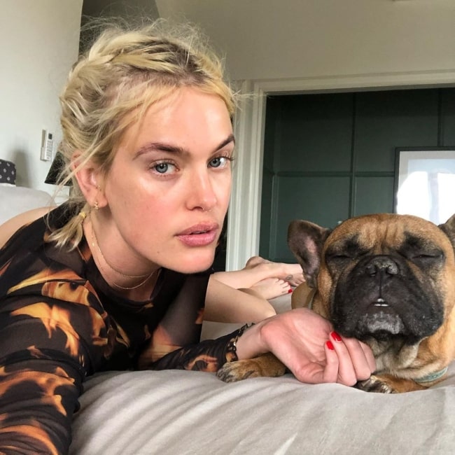Taylor Bagley as seen in a selfie taken with her dog Adam McDerpy in April 2020