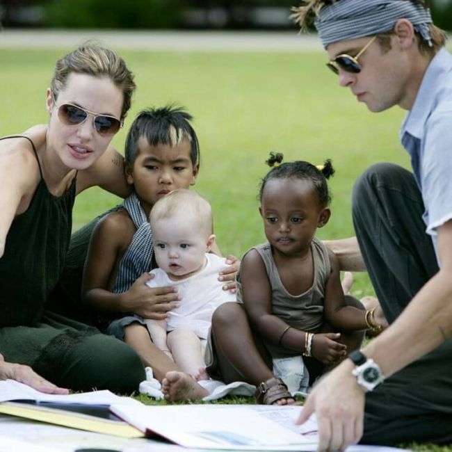 A young Maddox seen hanging out with his family