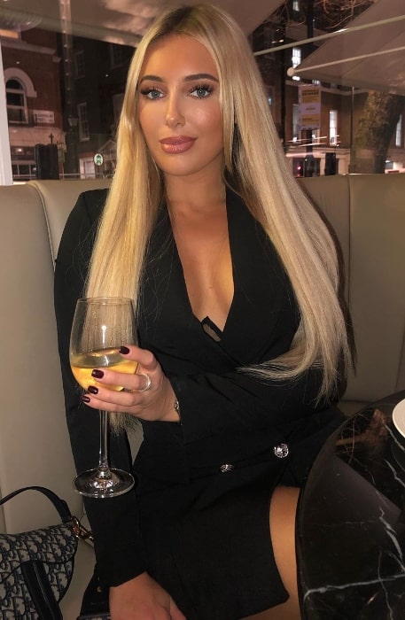 Amber Turner looking stunning in a black dress for a date night at Bloomsbury Street Kitchen in January 2020