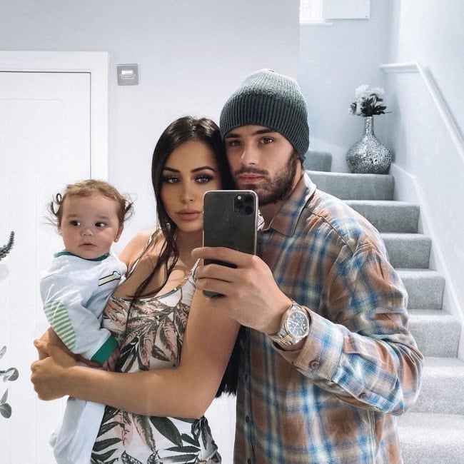 Casey Johnson as seen in a picture taken with his beau Marnie Simpson and their son Rox in May 2020