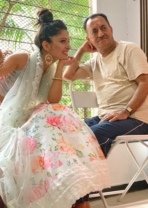 Charlie Chauhan as seen in a picture alongside her father