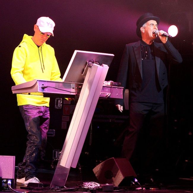 Chris Lowe (left) and Neil Tennant performing in a Pet Shop Boys concert in 2006