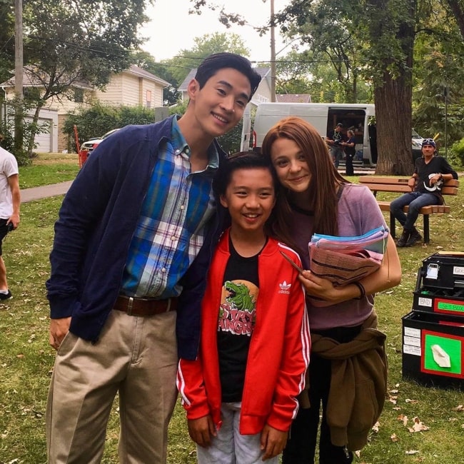 Ian Chen as seen in a picture taken on the set of A Dog's Journey (2019) along with actress Kathryn Prescott and actor Henry Lau in 2019