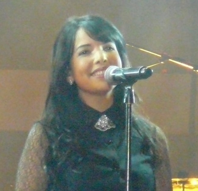 Indila pictured on stage on the Grand-Place in Brussels, Belgium on September 26, 2014, for the Feast Day of the French Community