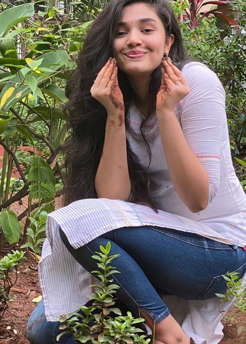 Krithi Shetty posing for a picture while planting a sapling in July 2020