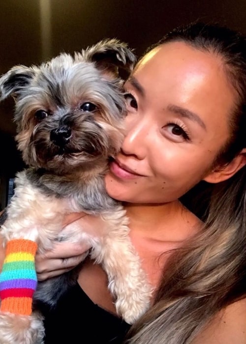 Li Jun Li posing for a picture along with her pet ToTo in New York City, New York in August 2019