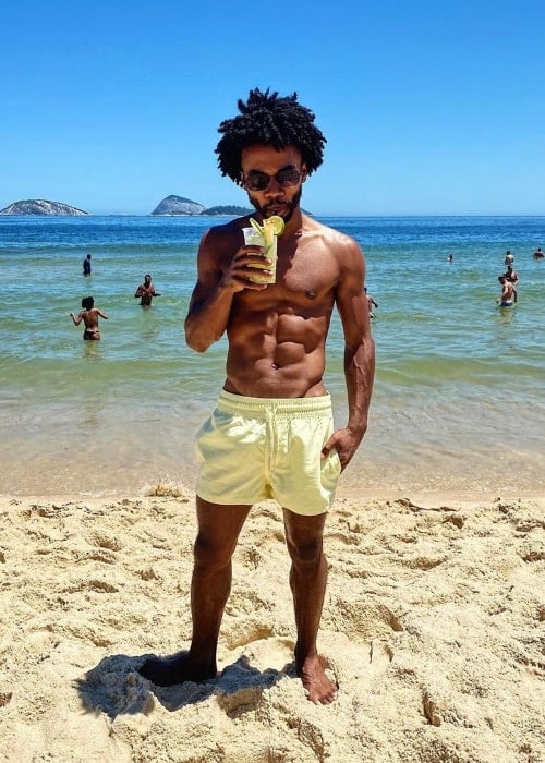 Luke Youngblood as seen while posing shirtless for a picture at a beach in Ipanema, Brazil