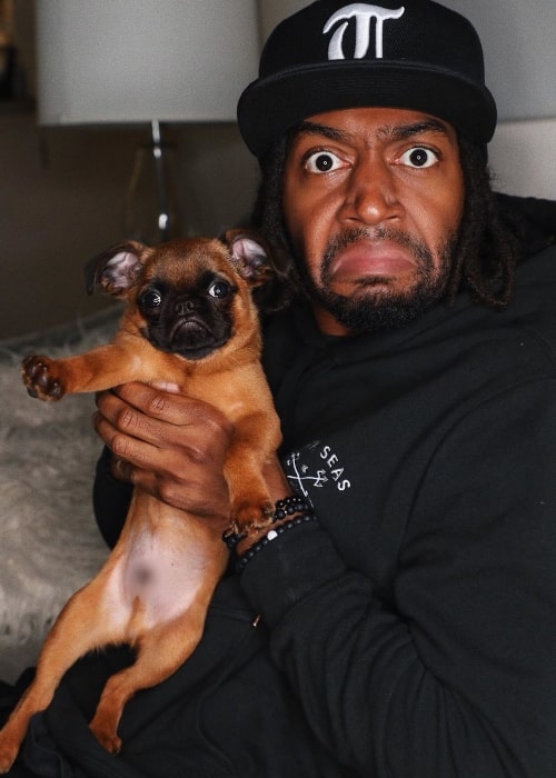 Marlon Webb as seen while posing for a picture with his dog in May 2019