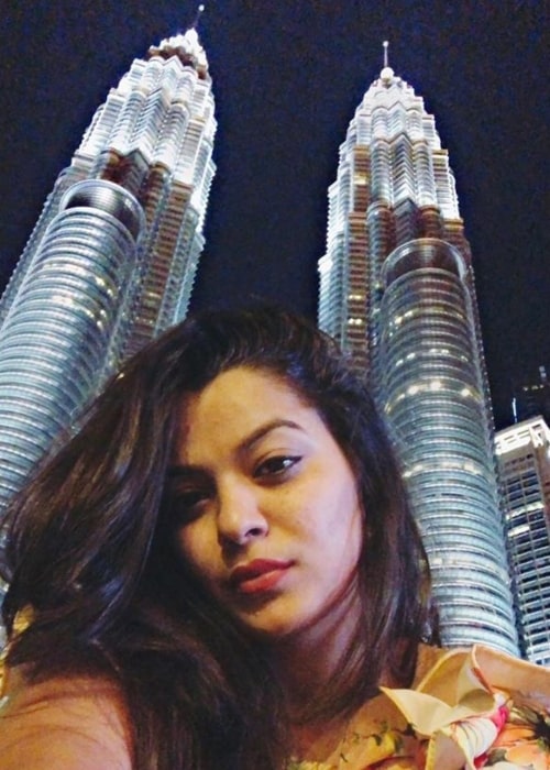 Nidhi Jha as seen in a selfie that was taken in front of the Petronas Twin Towers in Kuala Lumpur, Malaysia during a tour in the past