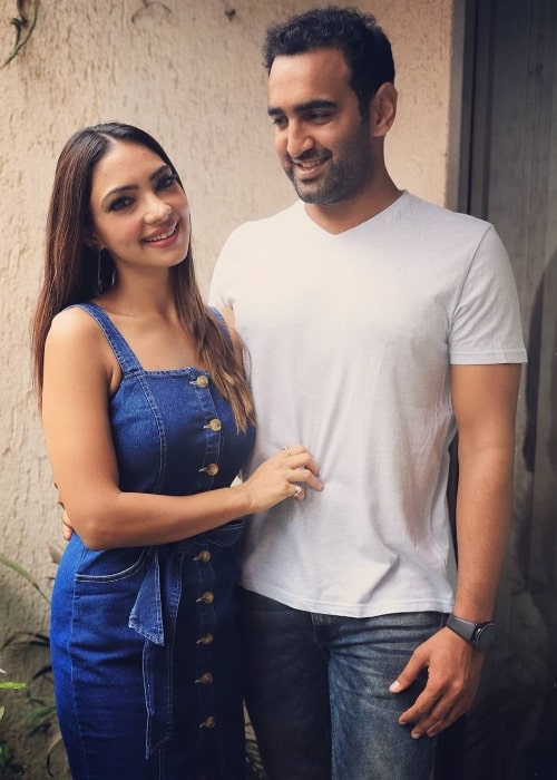 Pooja Banerjee as seen while posing for a picture alongside her husband Sandeep Sejwal in May 2020