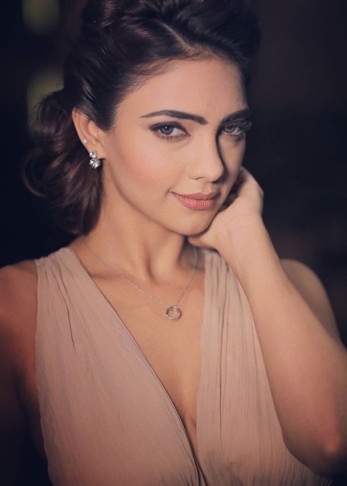 Pooja Banerjee as seen while posing for the camera