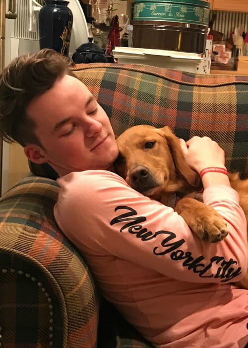 Ryan Prunty with his dog as seen in December 2019