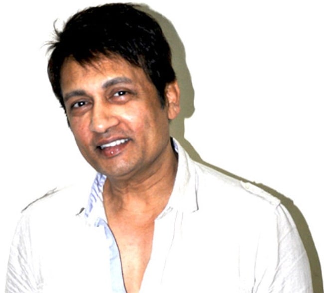 Shekhar Suman as seen while smiling for the camera