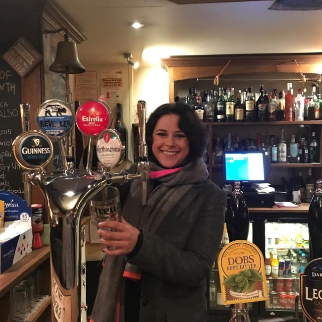 Belinda Stewart-Wilson enjoying a pint in the past