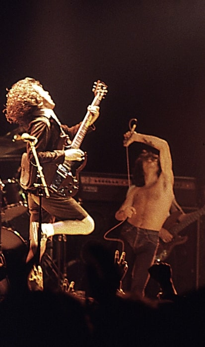 Bon Scott (Right) and Angus Young as seen while performing at the Ulster Hall, Belfast in August 1979