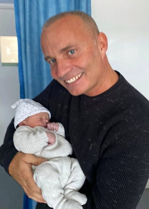 Darren Barker in a picture that was taken while held Lake Barker on the day of his birth in October 2019