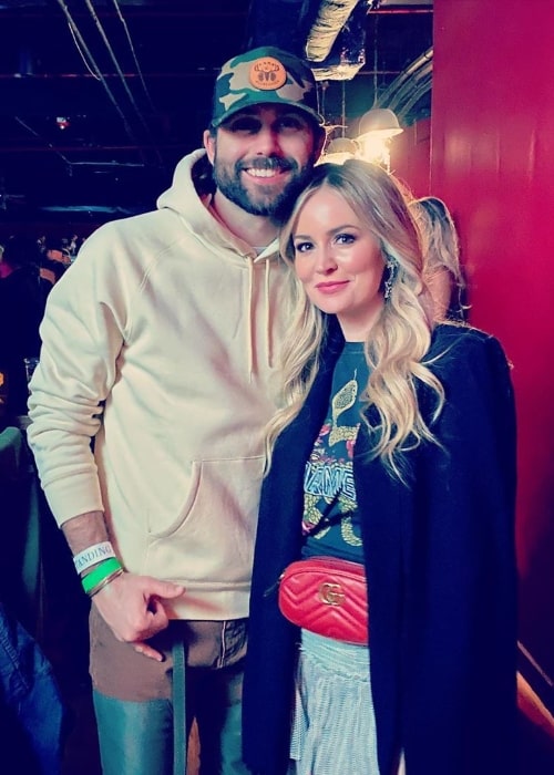 Emily Maynard posing for a picture alongside Tyler Johnson at the Fillmore Charlotte in Charlotte, North Carolina