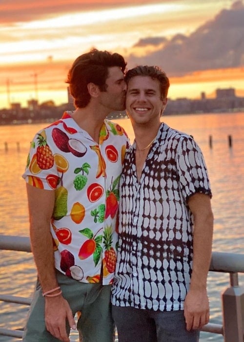 Eric Mondo (Right) smiling for a picture alongside Hunter Goga in New York City, New York