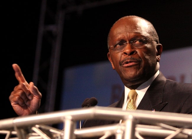 Herman Cain pictured at the Ames Straw Poll in Ames, Iowa in August 2011