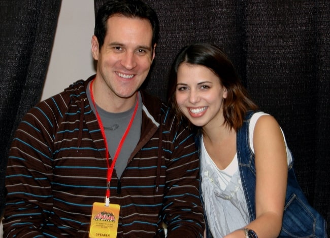 Laura Bailey smiling in a picture alongside Travis Willingham in September 2009