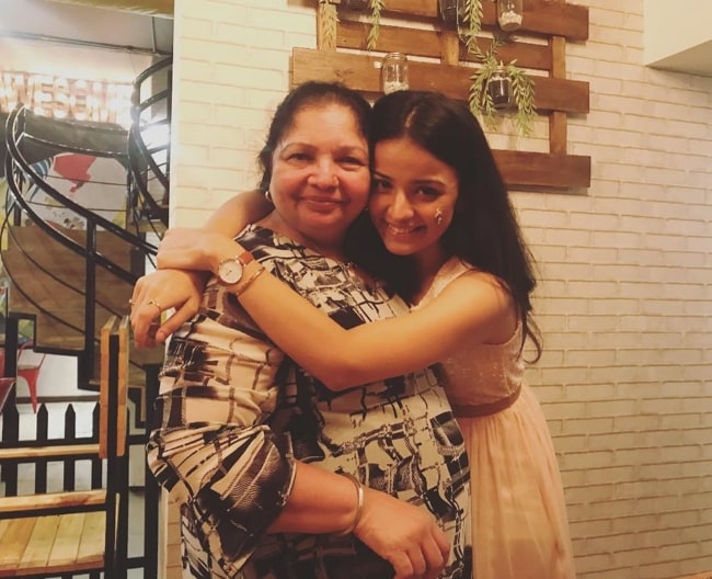 Mahima Makwana posing for a picture alongside her mother