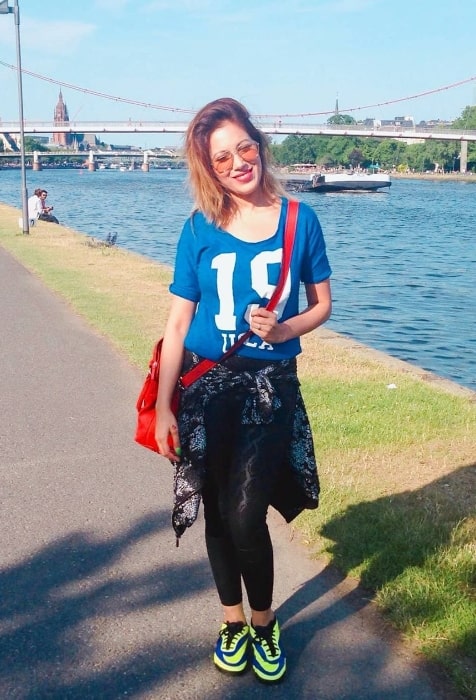 Munmun Dutta smiling in Frankfurt, Germany in June 2015