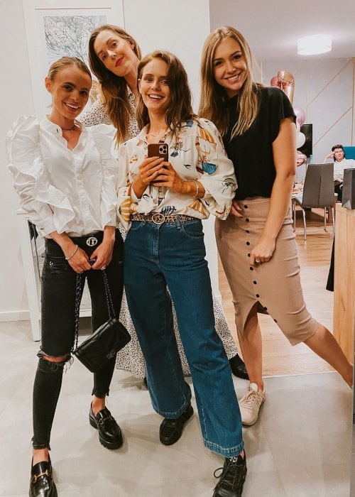 Olga Kalicka as seen in a selfie that was taken with her friends business partner C @ R O L I N E (Left), actress Ewelina Bator (Center), and her friend Paula in August 2020