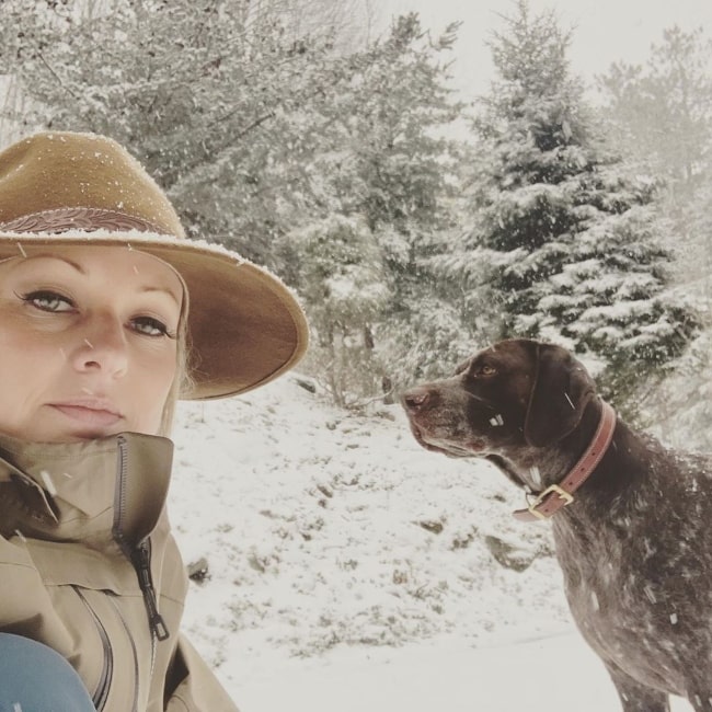 Sandra Smith taking a selfie along with her dog in March 2020