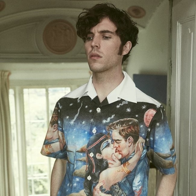 Tom Hughes as seen in a picture that was taken in London while sporting a shirt from MR PORTER