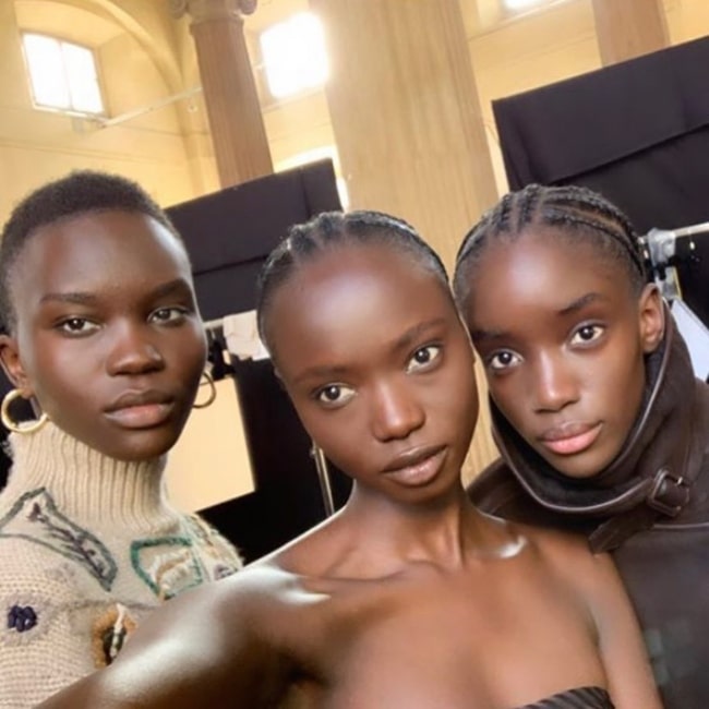 Achenrin Madit as seen in a selfie with fellow models Agi Akur and Maty Fall Diba in February 2020