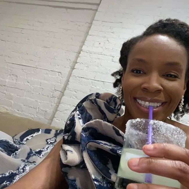 Amber Ruffin enjoying a drink in March 2020