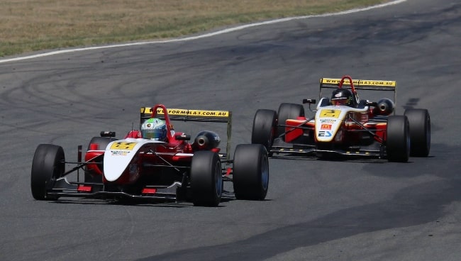 Calan Williams (Rear) driving for Gilmour Racing and chasing Jon Collins (Front) in a non-championship event at Wakefield Park in 2017