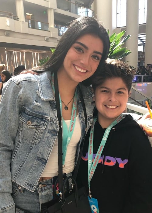 Enzo Lopez and Dixie D’Amelio smiling for the camera at Playlist 2020 at Orlando World Center Marriott in Orlando, Florida